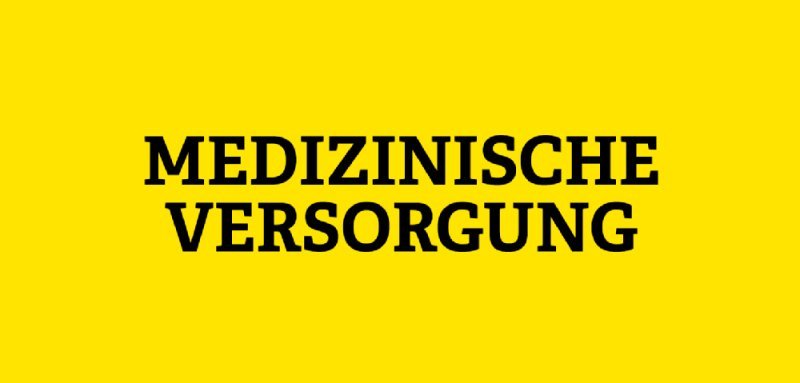 Gelbe Kachel mit Aufschrift Medizinische Versorgung