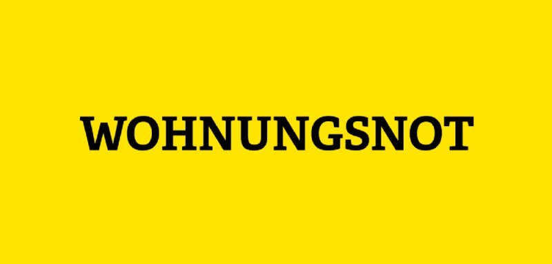 Gelbe Kachel mit Aufschrift Wohnungsnot